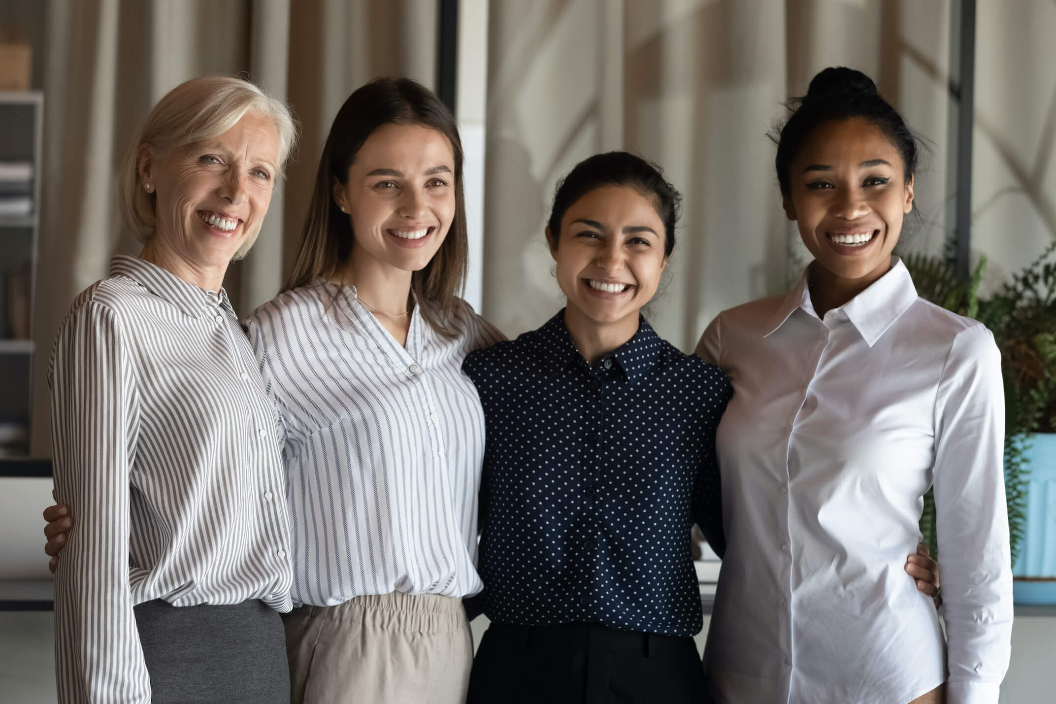 Happy,Diverse,Multiethnic,Female,Employees,Workers,Pose,For,Team,Portrait