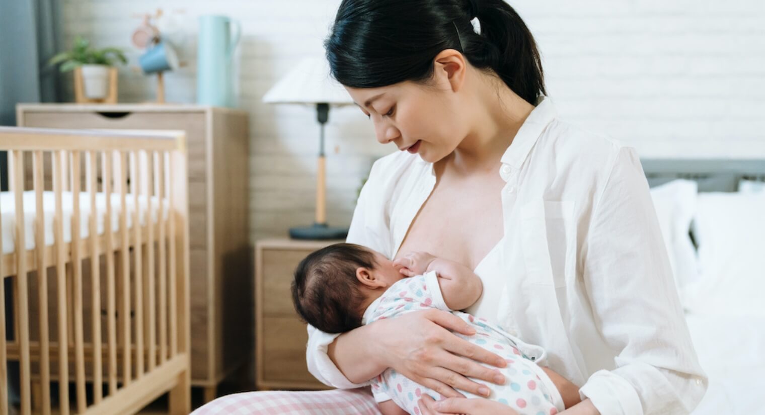 Mother breast feeding