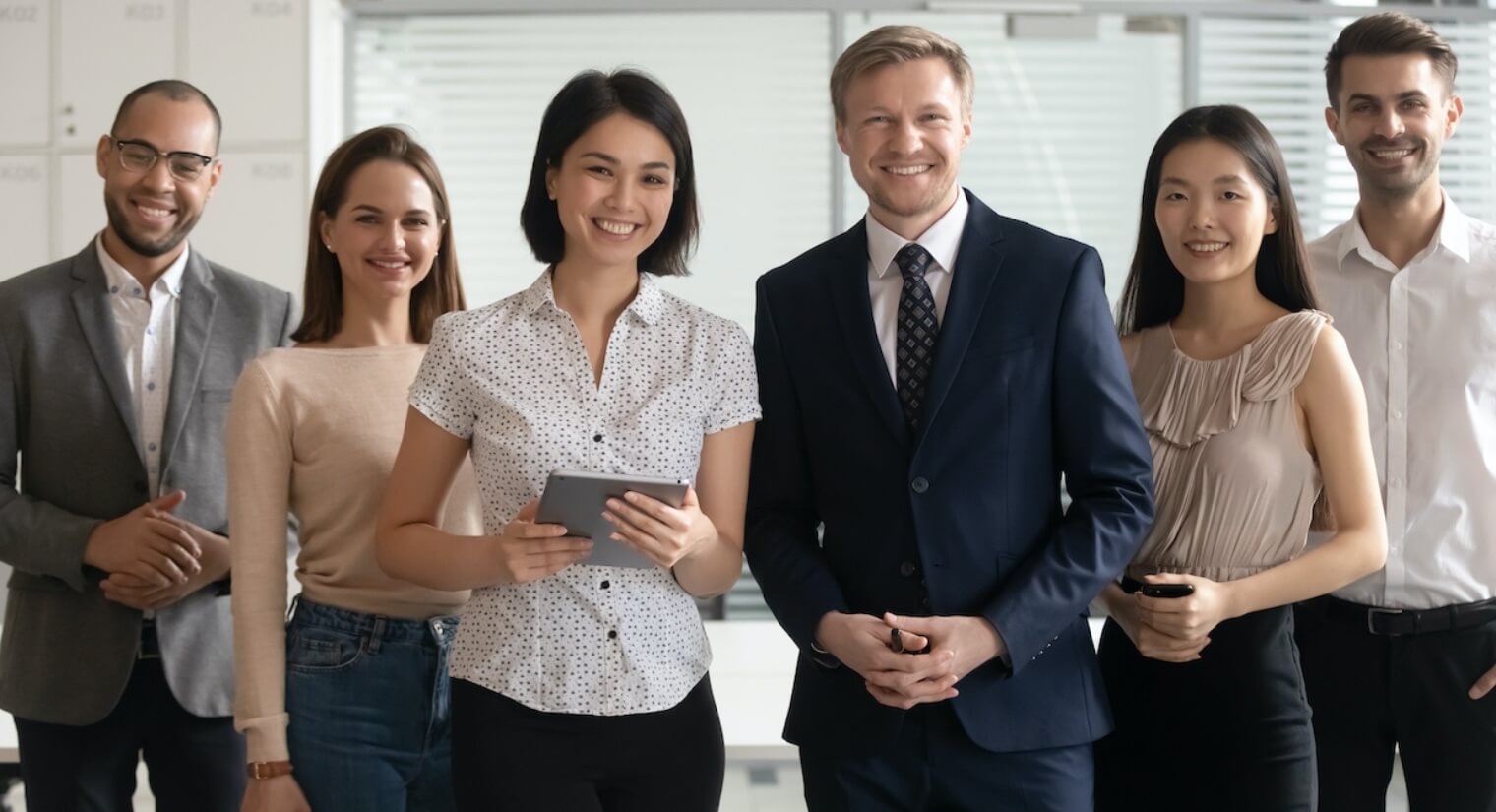 Diverse,Professional,Business,Leaders,Posing,With,Multicultural,Workers,In,Office,
