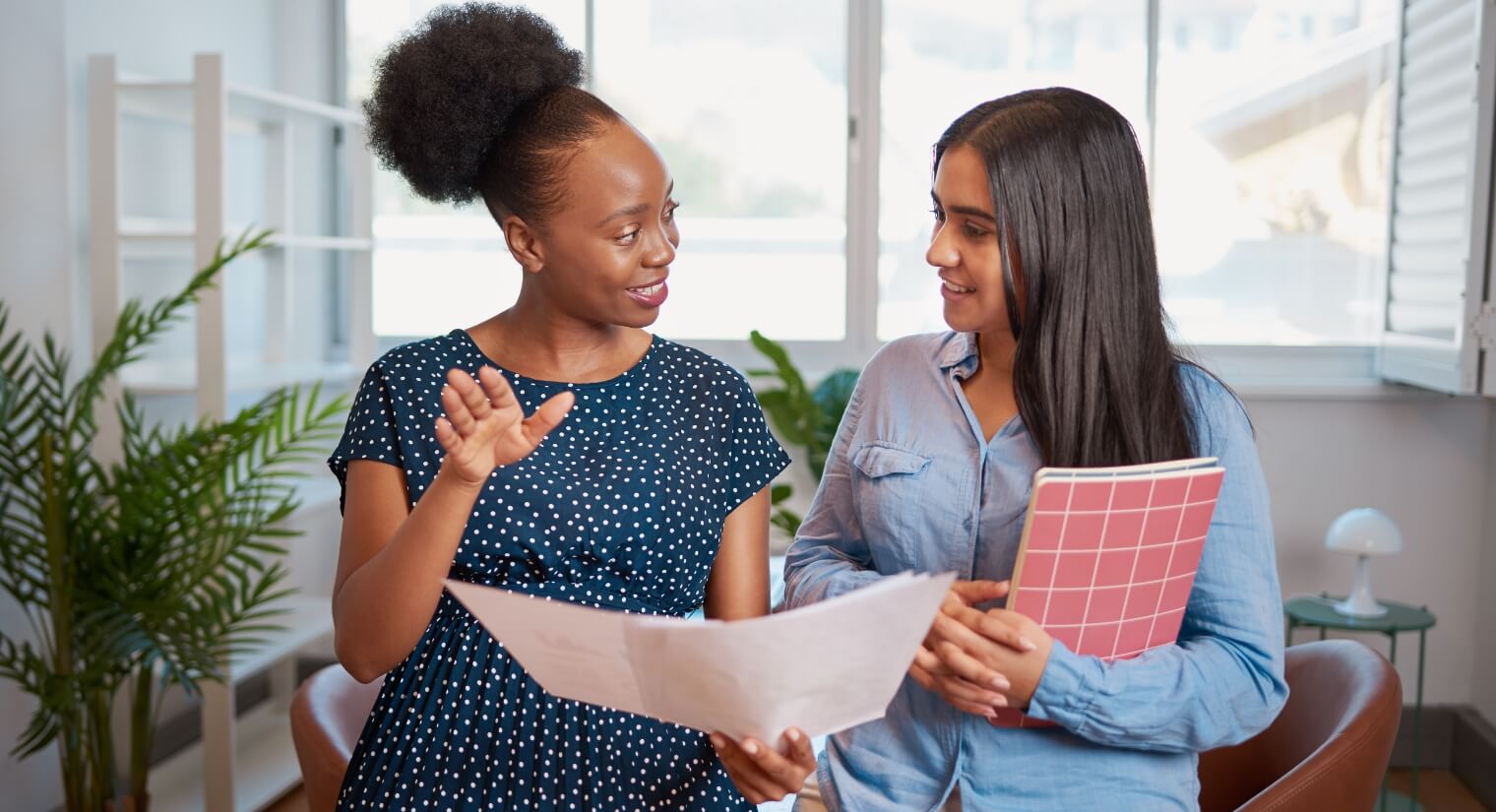 two women working in office